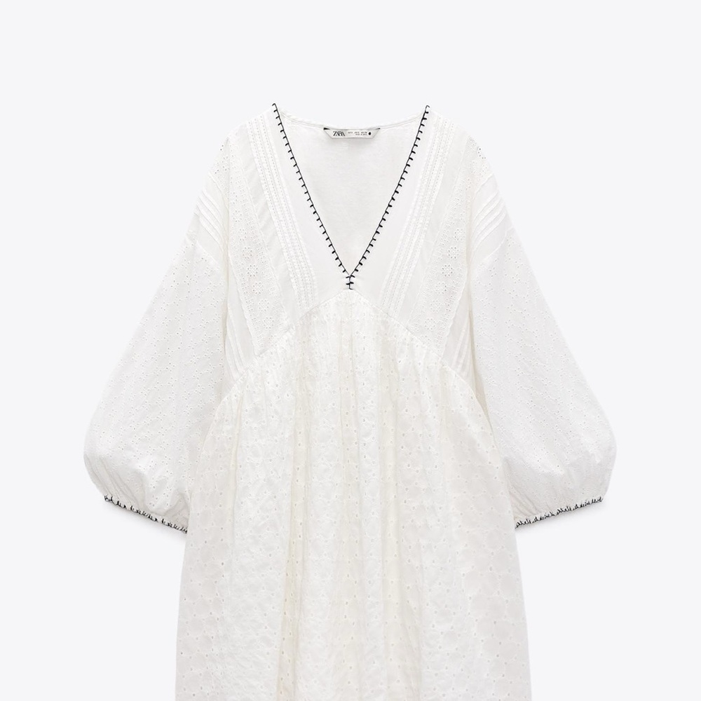White V-Neck Dress with Black Trim